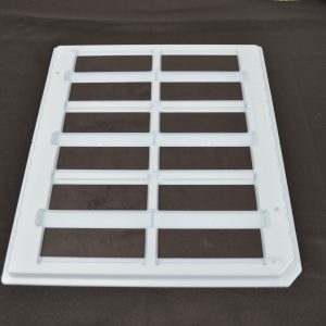 Thermoformed inherently dissipative tray with high temp inserts